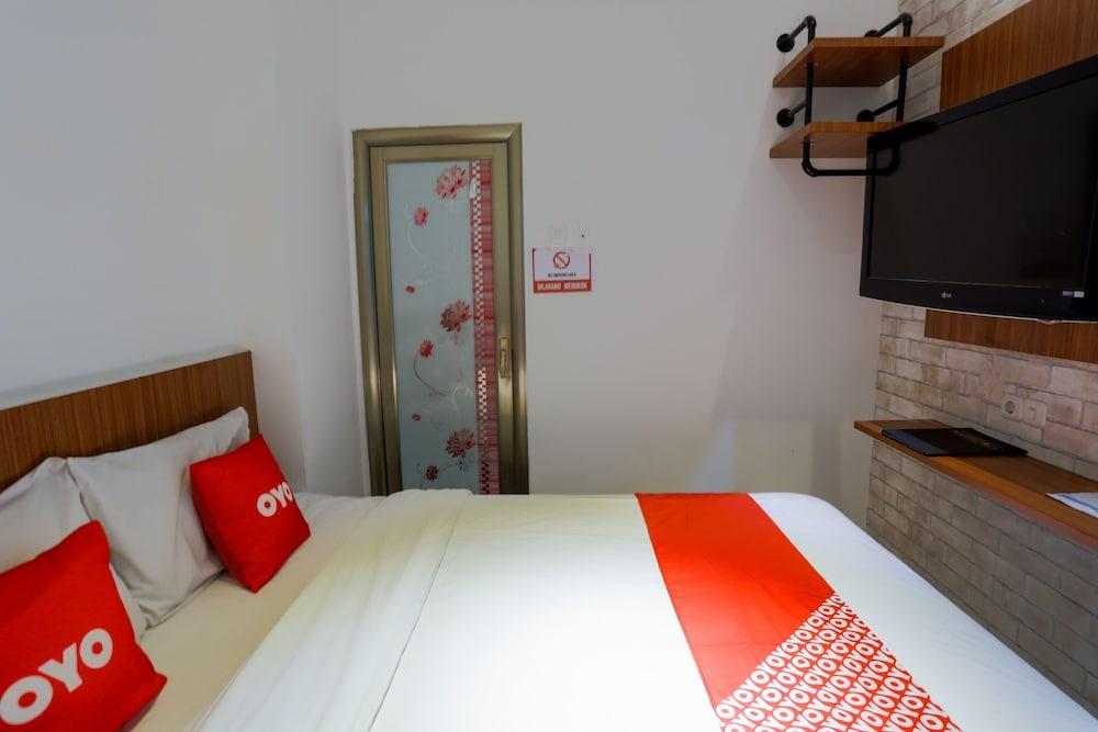 Hotel O Point Inn Room Type - Standard Double Room