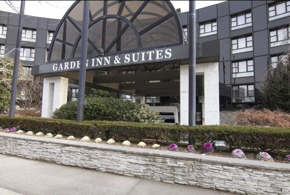 Garden Inn & Suites - Tap to explore photos