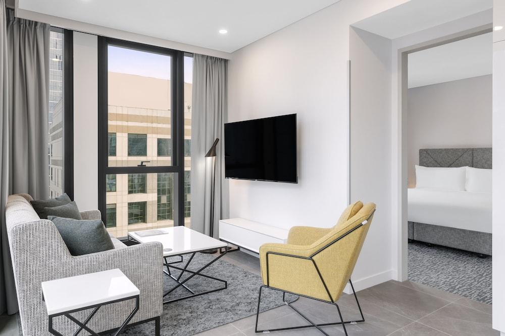Meriton Suites Melbourne - Tap to explore photos