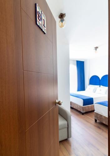 Cheers Vera Edition Hotel Room Type - Deluxe Triple Room