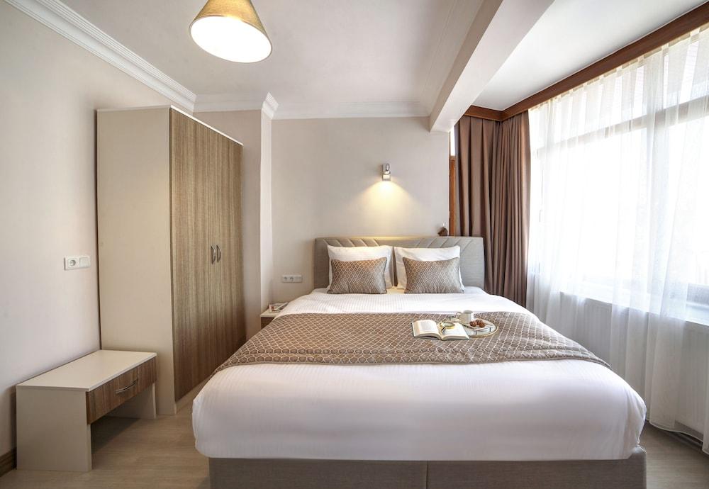 Seven Roses Apart Hotel - Tap to explore photos