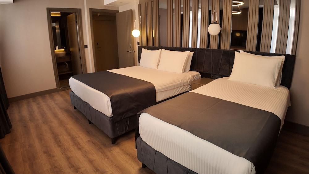 The Nest Hotel Room Type - Deluxe Triple Room