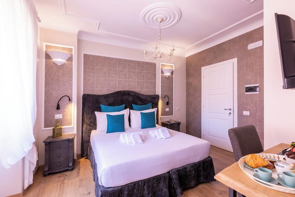 Trastevere Paper Suites - Tap to explore photos