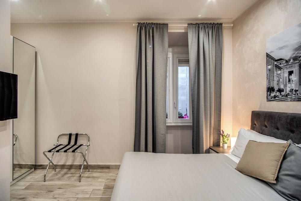 Tacito 23 - Luxury rooms - Tap to explore photos