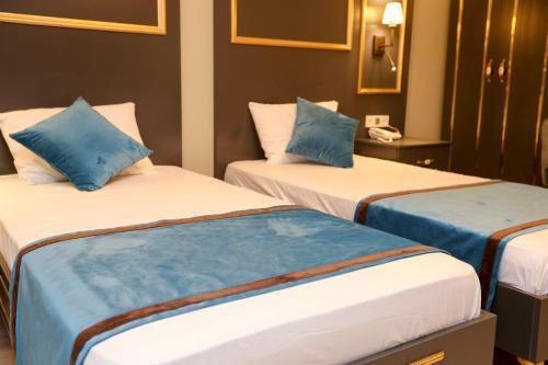 Grand Moon Hotel Suites - Tap to explore photos