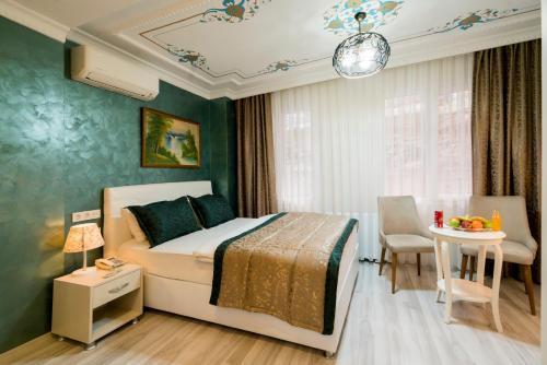 ATAM HOTEL Room Type - Deluxe King Room