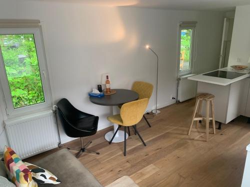 Tiny Houseboat B&B on the Amstel River - Tap to explore photos