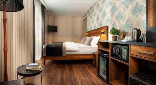 Hotel Bossuite Business - Tap to explore photos