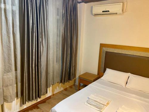 Herton Boutique Hotel - Tap to explore photos