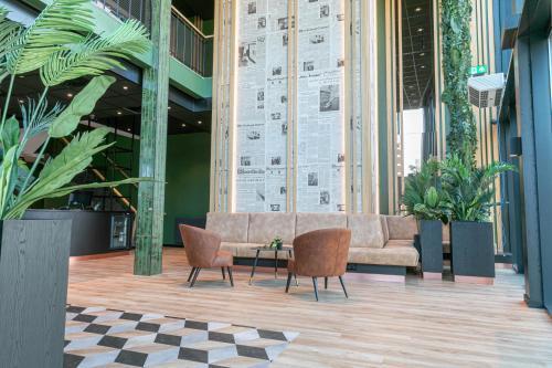 Distrikt Hotels Amsterdam Zaandam - Tap to explore photos