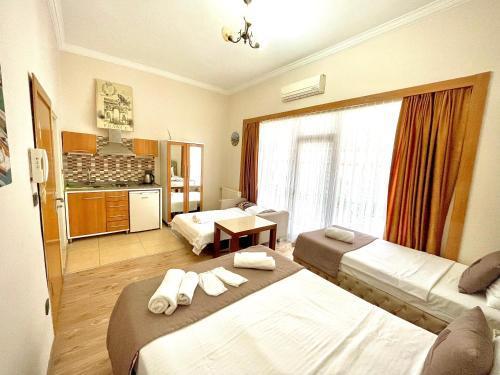 Elegance Aparts Cihangir Room Type - Classic Quadruple Room Elegance Aparts Cihangir Room Type - Classic Quadruple Room