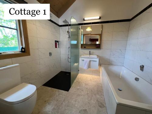 Olinda Country Cottages - Tap to explore photos