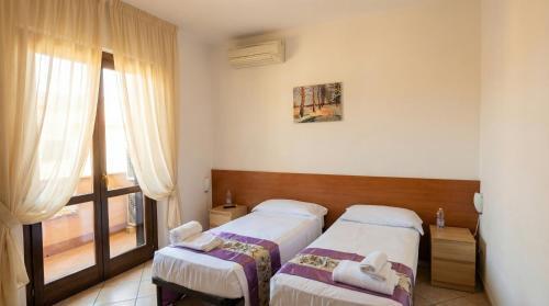 B&B Isola Room Type - Double or Twin Room with Private Bathroom B&B Isola Room Type - Double or Twin Room with Private Bathroom