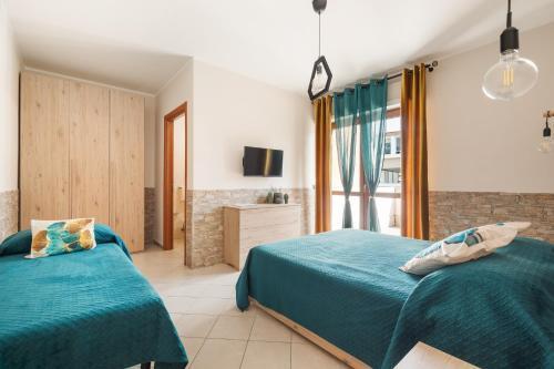 Giramondo Guest house Room Type - Deluxe Room (2 Adults + 1 Child)