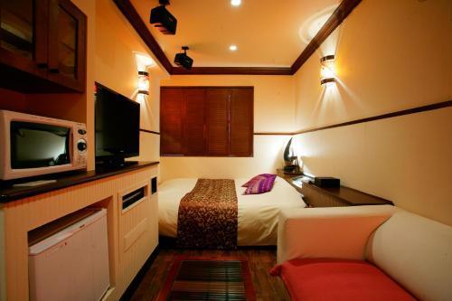 HOTEL CHECK INN BALI adult only - Tap to explore photos