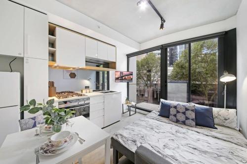 A Comfy & Modern 2BR Apt Near Melbourne Central - Tap to explore photos