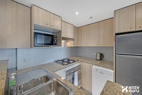 KozyGuru | Haymarket | 2Bed 2Bath Apt - Tap to explore photos