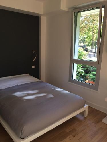Trés Beau Studio (face bois), 10mn de l'Etoile