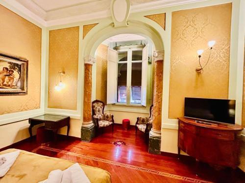 Eccelso Suites - Tap to explore photos