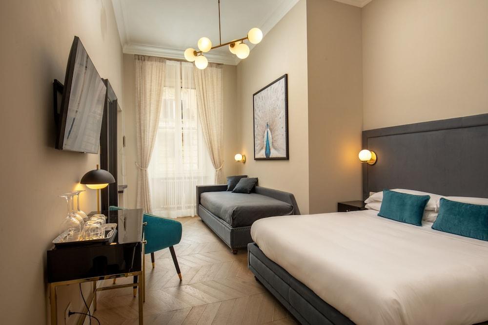 Porta Castello Suites Room Type - Deluxe Triple Room