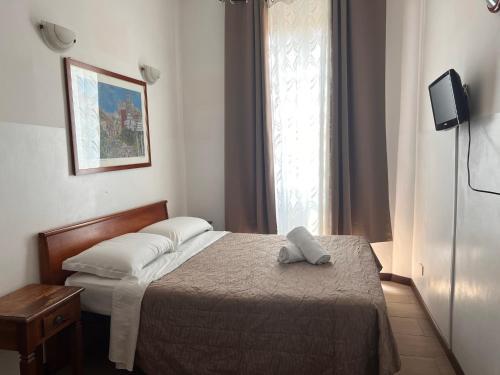 Booking inn Settembre 95 - Tap to explore photos