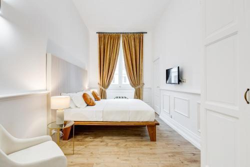 Monti Suites Cavour Room Type - Quadruple Room with Private External Bathroom Monti Suites Cavour Room Type - Quadruple Room with Private External Bathroom