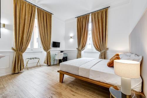 Monti Suites Cavour - Tap to explore photos