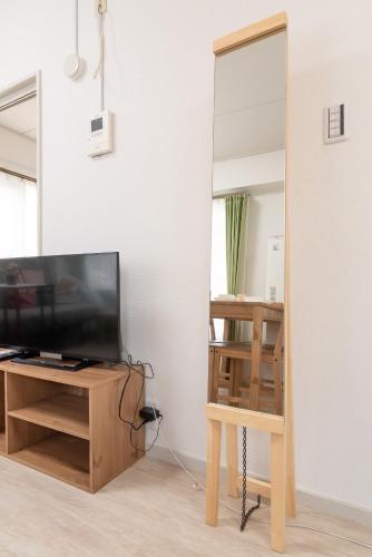 Uhome Iriya Apartment - Tap to explore photos
