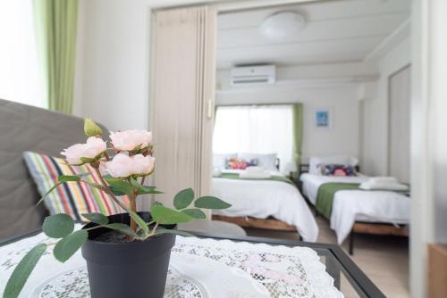 Uhome Iriya Apartment - Tap to explore photos