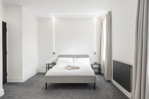 Modern Brixton Apartments - Tap to explore photos