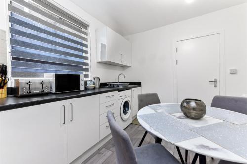 Stylish and Convenient 2BD Flat w/ Outdoor Space - Tap to explore photos