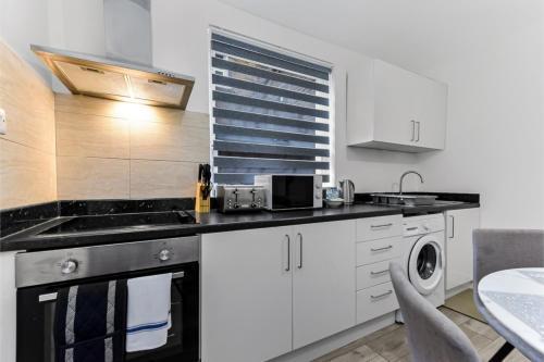 Stylish and Convenient 2BD Flat w/ Outdoor Space - Tap to explore photos