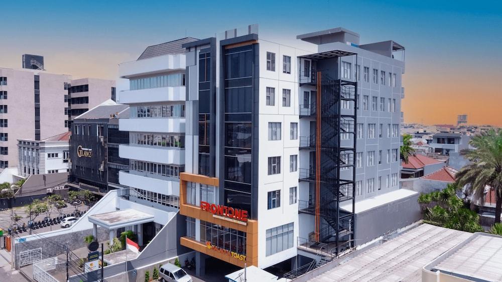 Front One Boutique Hotel Taman Anggrek - Tap to explore photos