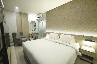 Front One Boutique Hotel Taman Anggrek - Tap to explore photos