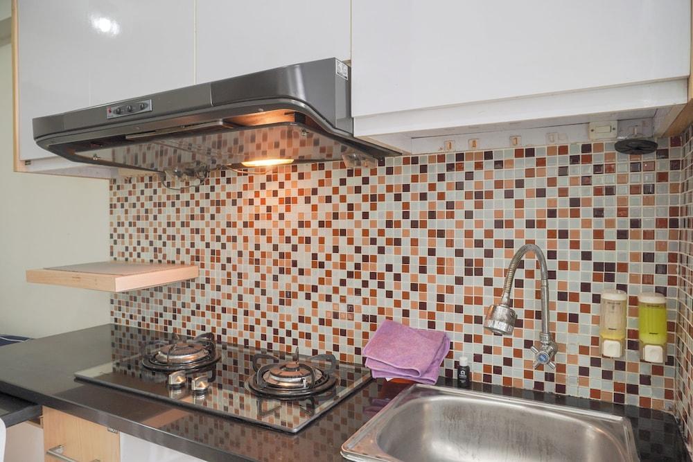 Nice And Modern 2Br At Green Pramuka City Apartment - Tap to explore photos