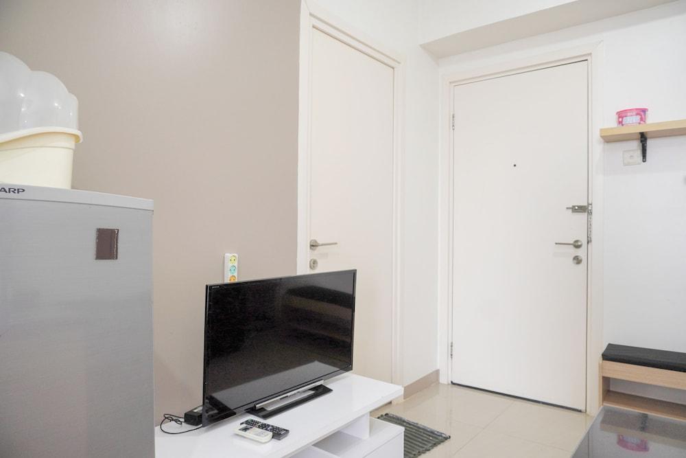 Nice And Modern 2Br At Green Pramuka City Apartment - Tap to explore photos