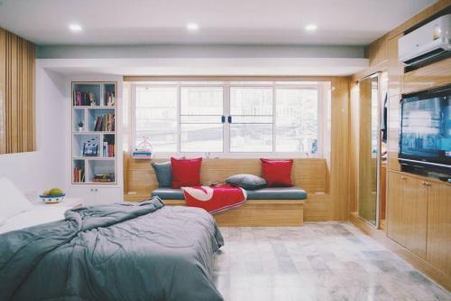 Double Studio, Private Bath, Shared Kitchen with Local Family by Pillows & Purrs - Tap to explore photos
