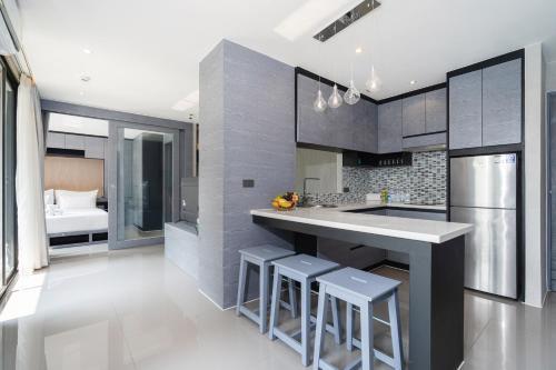 Citygate 2BR Condo L602/3, Several Pools, Gym & Rooftop - Tap to explore photos