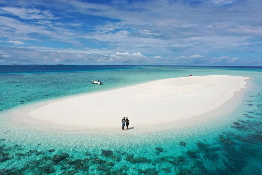Niru Isle Maldives - Tap to explore photos