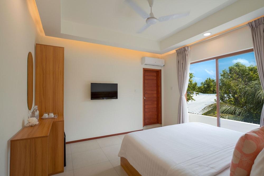 Niru Isle Maldives Room Type - Deluxe Double or Twin Room