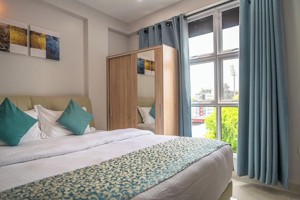 TOUR INN Room Type - Deluxe Room