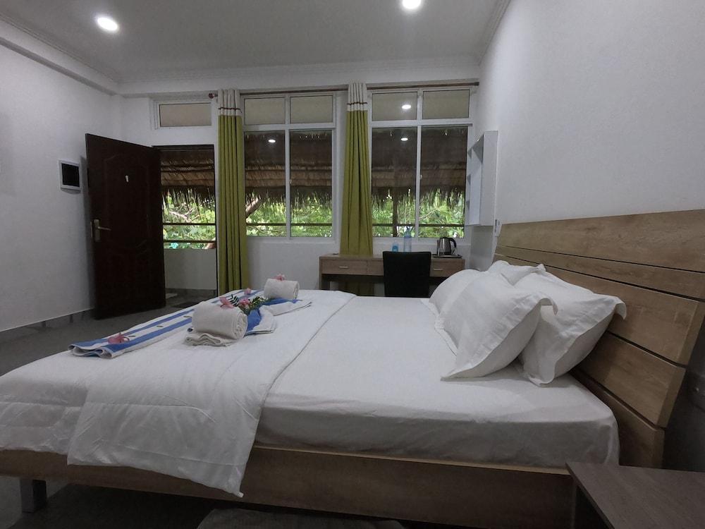 Dhangethi Inn - Tap to explore photos
