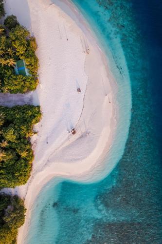 Hudhuveli Kamadhoo - Tap to explore photos