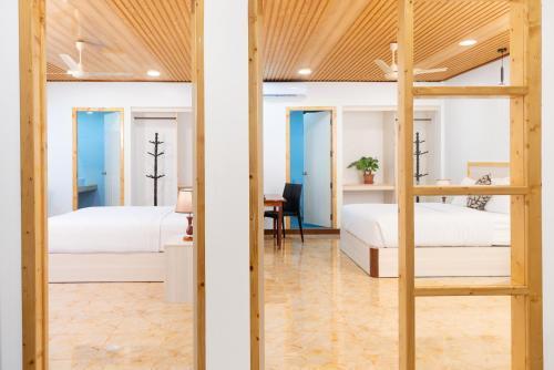 Hudhuveli Kamadhoo Room Type - Deluxe Room