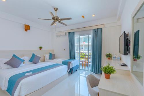 Dhiguveli Breeze Room Type - Deluxe Triple Room Dhiguveli Breeze Room Type - Deluxe Triple Room