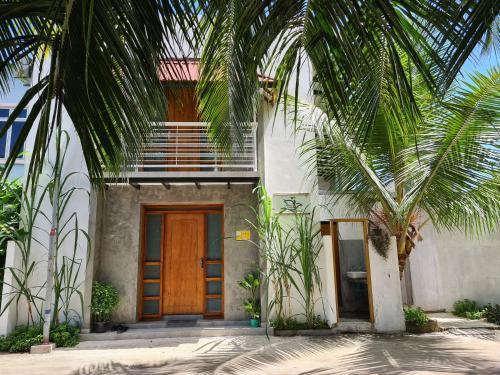 Dhooni Finolhu Guesthouse - Tap to explore photos