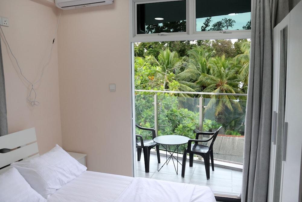 Equator Retreat Room Type - Deluxe Room, 1 Double Bed, Balcony, Partial Sea View
