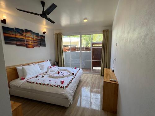 Finolhu Dhigurah Room Type - Deluxe Room