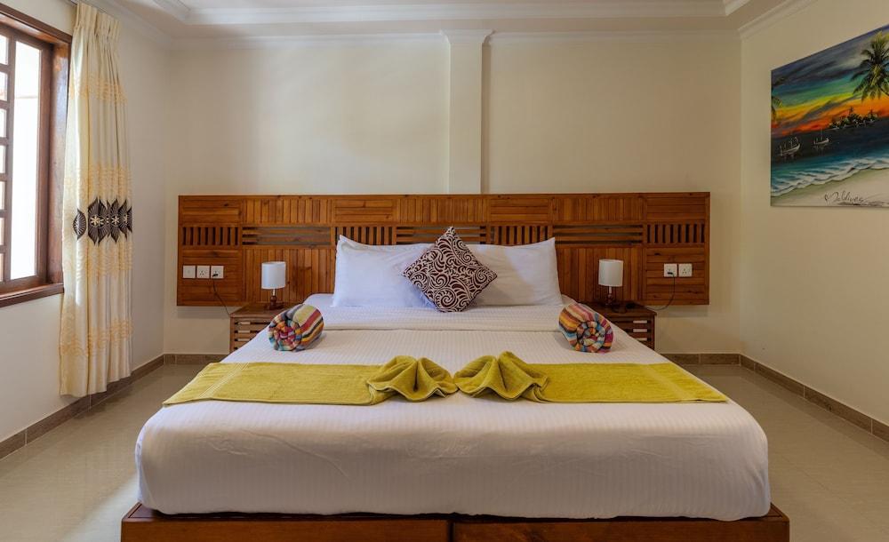 Kamadhoo Inn - Tap to explore photos