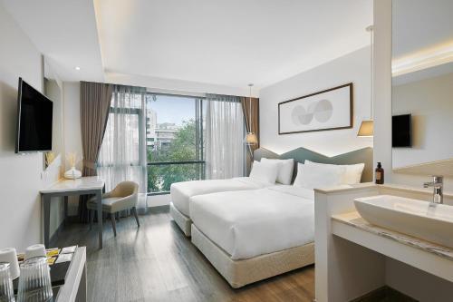 Livable Hotel Bangkok - Tap to explore photos